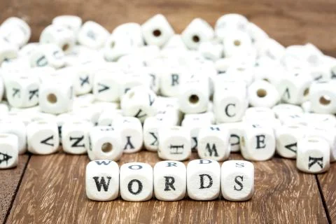 Word with dice on white background Foto stock