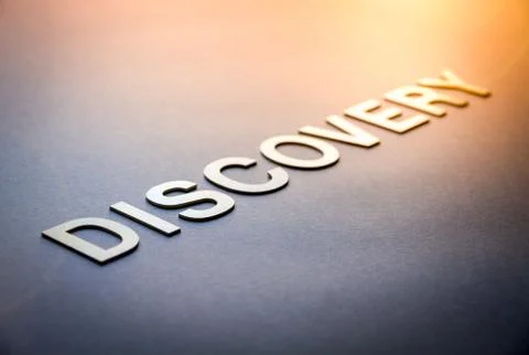 Word discovery written with white solid letters Stock Photos