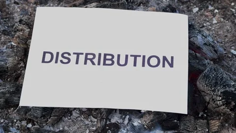 Word Distribution on a white sheet of paper burns into a fire against. Stock Footage 140813983