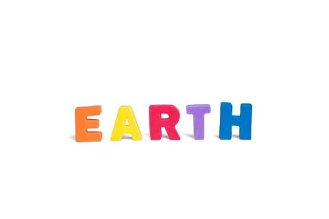 Word earth is made of multicolored three-dimensional sponge letters on a wh.. Stock Photos