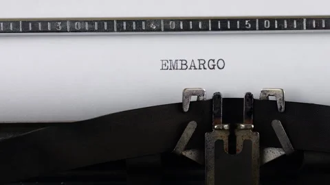 The word EMBARGO is typing on a retro typewriter. Stock Footage 314583281