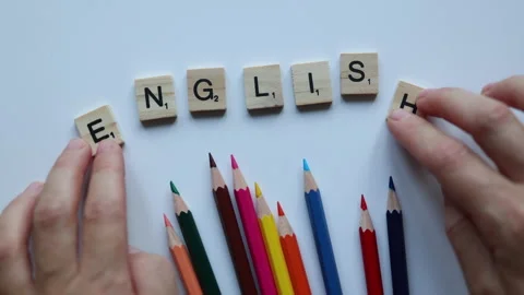 Word English composing with scrabble blocks letters. kids children education Stock Footage 157673326