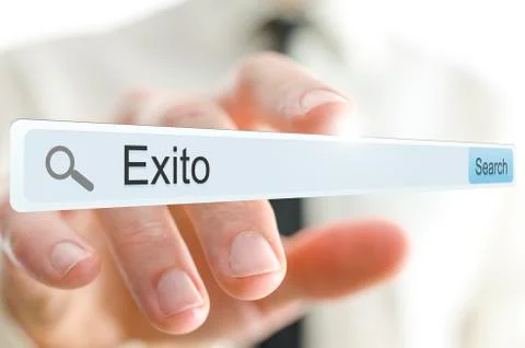Word Exito written in search bar. Spanish for success. Stock Photos