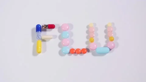 Word flu letters made of multicolored pills Stock Footage 152930466