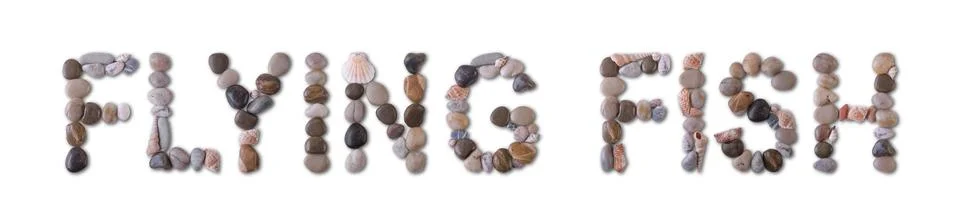 The word "FLYING FISH" is lined with shells and stones of different shapes an Stock Photos