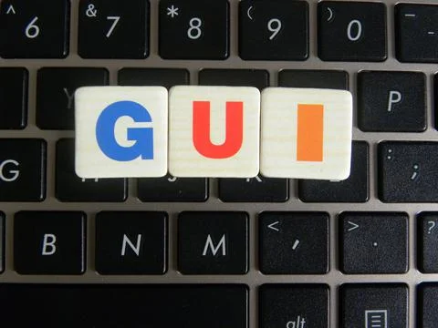 Word GUI (Graphical User Interface) on keyboard background Stock Photos