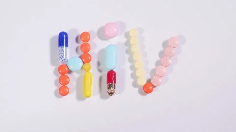 Word HIV made of multicolored tablets Stock Footage 152930472