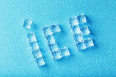 The word ICE is a pattern of ice cubes on a blue background 写真素材