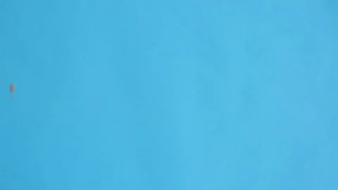 The word "ideas" it is written from sand on the blue screen Stock Footage 80291325