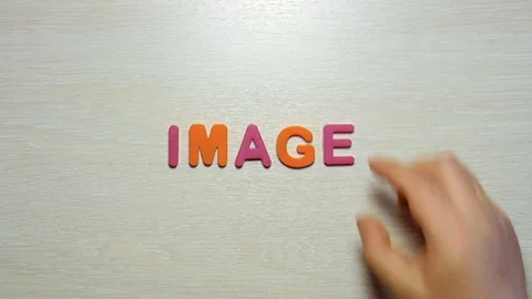 Word image is made up of plastic colored letters Stock Footage 79848809