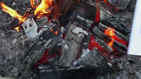Word Import on a white sheet of paper burns into a fire against. Slow motion Vídeos de archivo 138560711