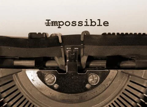 WORD IMPOSSIBLE with the text IM deleted and then everything is possible writ Stock Photos