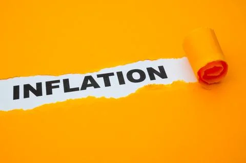 Word Inflation on white surface. Stock Photos