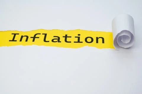 Word Inflation on yellow surface. Stock Photos