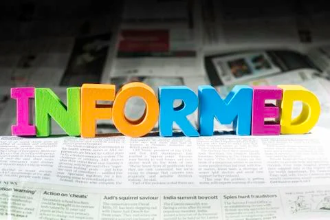 Word informed on newspaper Foto stock