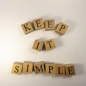 The word keep it simple was created from wooden cubes. education concept. Foto stock