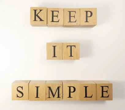 The word keep it simple was created from wooden cubes. education concept. Stock Photos