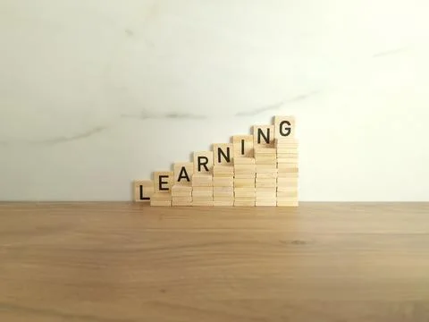 Word learning made from wooden blocks Stock Photos