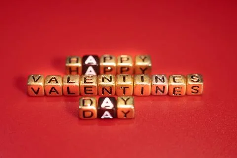 The word from the letter cubes put on the table a happy Stock Photos