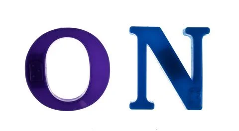 On word lined with plastic multicolored letters on white background, Foto stock