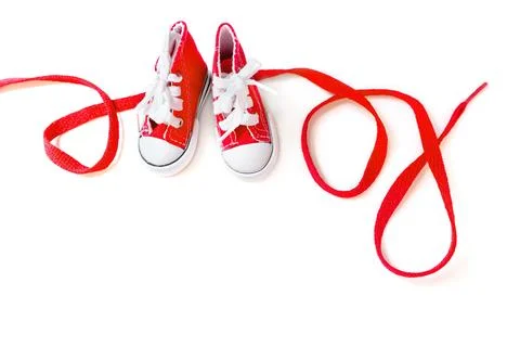 Word Love Made From Tiny Red Sneakers and a Lace 스톡 사진