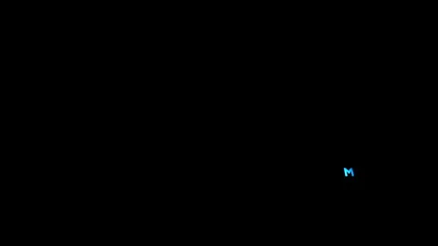 The word man is typed on a glowing computer keyboard in the dark Stock Footage 98053798