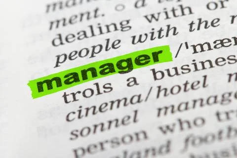 Word manager in dictionary Stock Photos