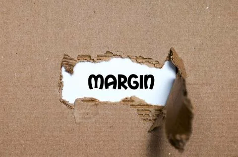 The word margin appearing behind torn paper Foto stock