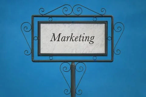 The Word "Marketing" on a Signboard Stock Photos