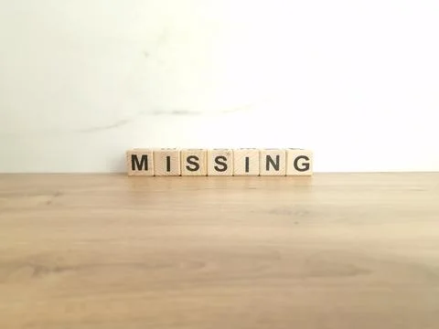 Word missing made from wooden blocks Stock Photos