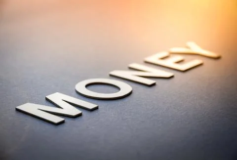 Word money written with white solid letters Foto stock