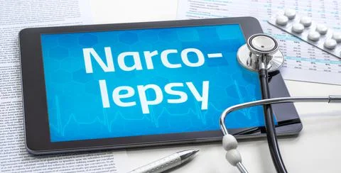 The word Narcolepsy on the display of a tablet 库存照片