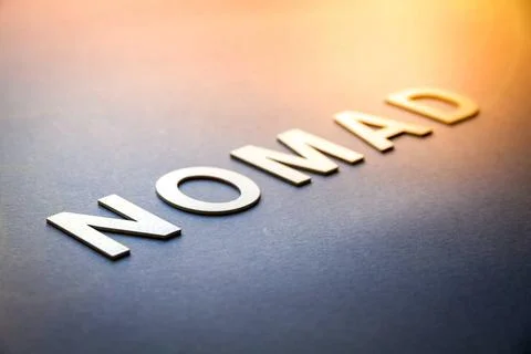  Word nomad written with white solid letters Word nomad written with white... Foto stock