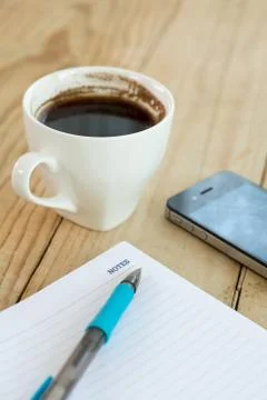 Word notes on the memos with pen and coffee on wooden background Foto stock