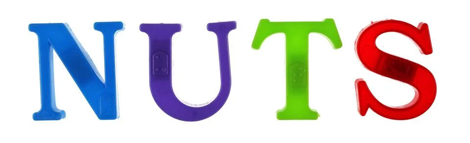 Word nuts is lined with multicolored plastic letters on magnets, Stock Photos