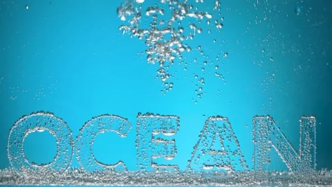 Word ocean underwater in oxygen bubbles on blue background. Stock Footage 154489061