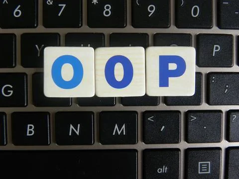 Word OOP (Object Oriented Programming) on keyboard background Stock Photos