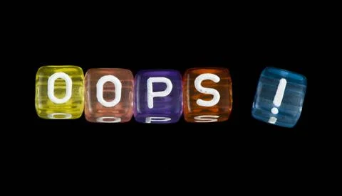Word Oops Word Oops. Black isolated cubes ,model released, Symbolfoto Copy... Stock Photos