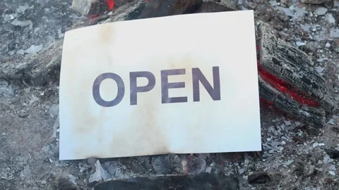 Word Open on a white sheet of paper burns into a fire against. Slow motion Vídeo Stock 138692069