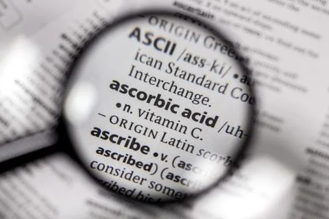 The word or phrase ascorbic acid in a dictionary. Stock Photos