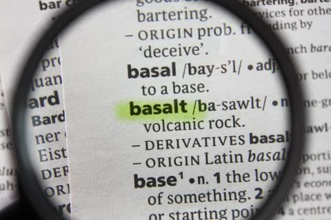The word or phrase basalt in a dictionary. Stock Photos