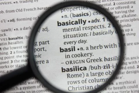 The word or phrase basil in a dictionary. Stock Photos