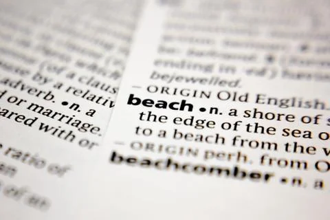 Word or phrase beach in a dictionary. Stock Photos