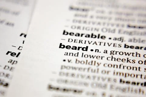 Word or phrase beard in a dictionary. Stock Photos