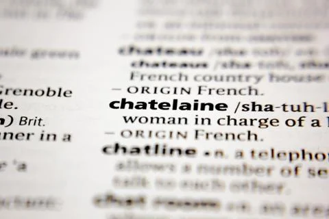 Word or phrase chatelaine in a dictionary. Stock Photos