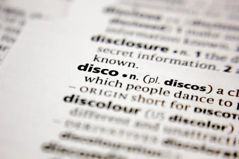 Word or phrase disco in a dictionary. Stock Photos