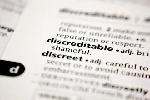 Word or phrase discreditable in a dictionary. Stock Photos