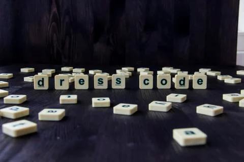 Word or phrase DRESS CODE made with  letters on the wood, great image for you Stock-Fotos