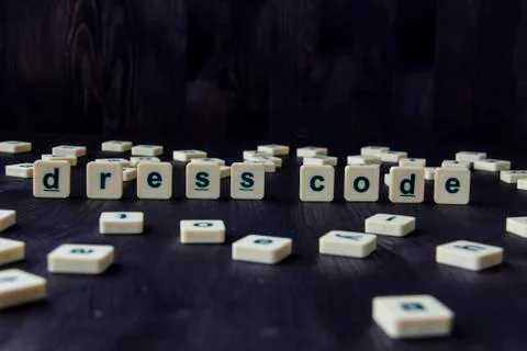 Word or phrase DRESS CODE made with  letters on the wood, great image for you Foto stock