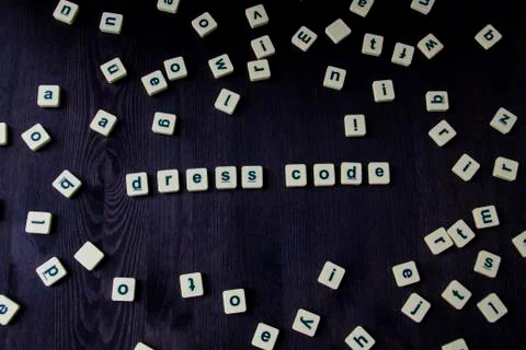 Word or phrase DRESS CODE made with  letters on the wood, great image for you Stock-Fotos
